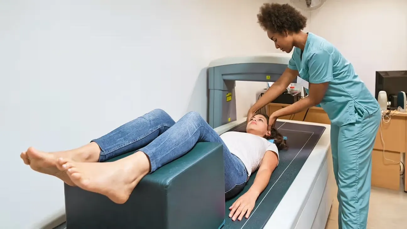woman receiving a DEXA body fat scan